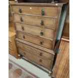 A 1930's oak 6 height chest on chest