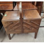 A 1930's oak 2 tier tea trolley; a cantilevered sewing box