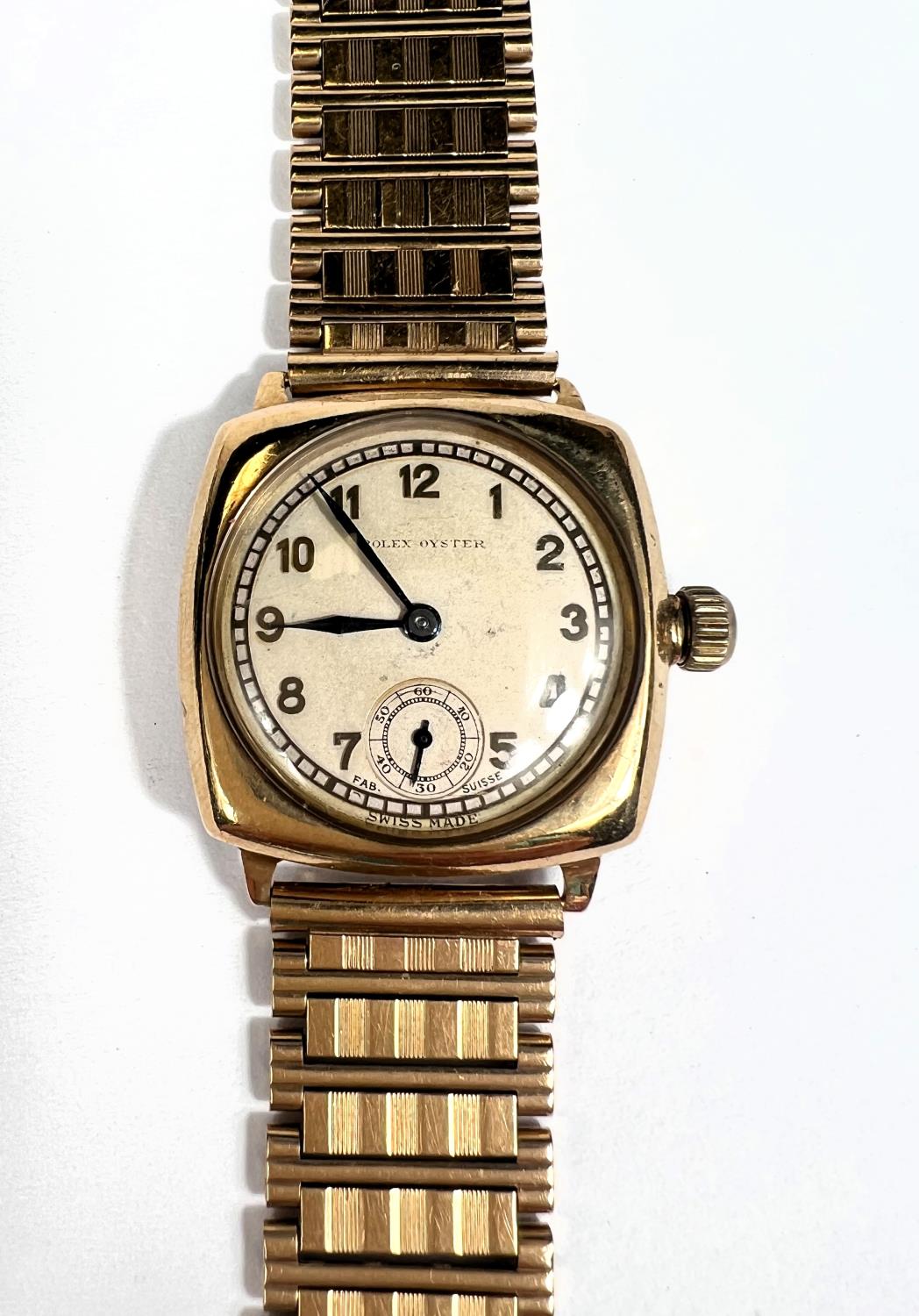 ROLEX: An Art Deco gold Rolex Oyster Wristwatch in 9ct gold case with 9ct gold strap, Arabic