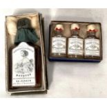 A boxed set of Grossmith's Prize Medal Perfumes, three miniature bottles, White Heliotrope,