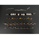 Four modern silver bracelets set amber stones; 2 silver bracelets, 1 set aquamarine coloured stones,