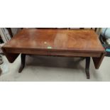 A reproduction figured mahogany dwarf sofa table/coffee table by "Reprodux" on 4 splay feet