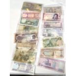 A selection of Middle Eastern banknotes: Qatar, Iraq, Saudi Arabia, UAE, etc.