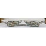 Two Chinese porcelain bowls with matching polychrome decoration of river and mountain scenes