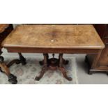 A Victorian burr walnut card table with quarter veneered fold-over top and marquetry decoration,