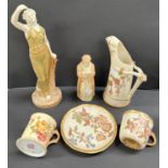 A Royal Worcester figure with outstretched arms, in subdued green porcelain; 5 items of Royal