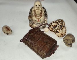 A selection of resin and other carved items.