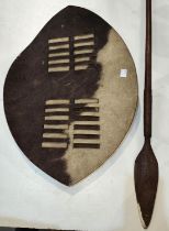 an African style tribal hide shield and similar spear with leather bound tip