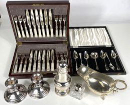 A selection of silver plate:  dwarf candlesticks; sugar dredger; cased spoons and berry spoons; a