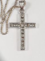 Unmarked metal cross set with 16 diamonds on 18ct white gold, square link chain 7.2gm (cross tests