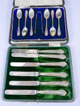 A boxed set of 6 hallmarked silver teaspoons and a pair of sugar nips, 2.8oz; a set of white metal