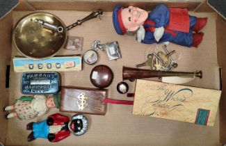 A vintage wind up postman, whistles and other vintage collectibles