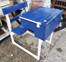 A mid 20th century child's school all in one desk and seat writing slope with hinged storage under