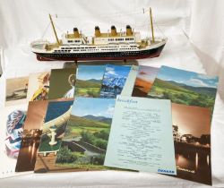 A wooden model of the Titanic and a selection of Cunard cruise menus RMS Queen Elizabeth , Queen