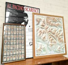 A scale wall map of the Yorkshire Dales with geographic heights of hills depicted, a Scarface poster