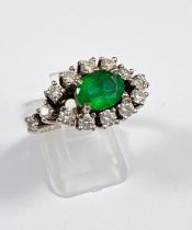 An Art Deco style 18ct white metal dress ring set with large central emerald. 8 x 6mm approx, size O