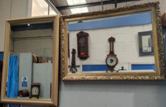 Two gilt framed wall mirrors