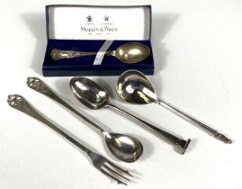 A Scottish hallmarked silver pair of spoon and fork pickle servers with pierced thistle terminals; 3