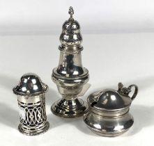 A Georgian silver baluster shaped spice shaker, Maker GS, London 1780, silver mustard pot and a