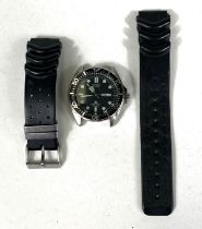 A vintage Citizen Quartz Promaster dive watch with black bezel, rubber bracelet