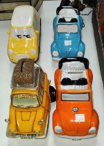 Four automobile money boxes to VW Beatles, a Mini and an Only Fools and Horses style