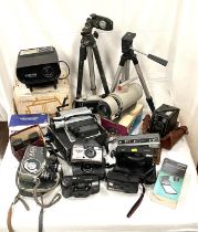 A large collection of vintage cameras equipment and accessories etc