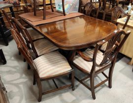 A good quality mahogany Rackstraw extending 8/10 seater pedestal mahogany dining table and 8 (6 plus