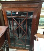 A 19th Century astragal glazed wall hanging corner cupboard, a smaller mahogany floor standing