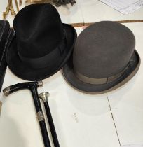 A grey Lincoln Bennett bowlers hat, another gents Dress hat silver tipped ebonized walking stick and