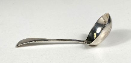 A silver ladle stamped 925