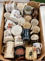 A select ceramic tankards and large cups advertising a little wares Including Royal Commemorative