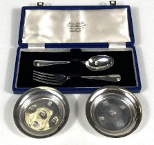A hallmarked silver christening spoon and fork, cased, Sheffield 1960; a hallmarked silver pair of
