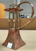 An Arts and Crafts copper and brass Jungenstil candle holder by Carl Deffner, height 15.5cm