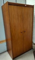 A mid 20th century teak, two door wardrobe with interior drawers 92 x 170 x 57cm, interior chest