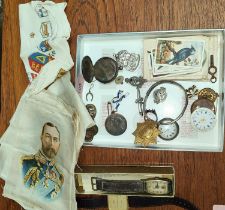 A selection of silk cigarette cards and silks, Territorial Army badge, ARP badge, other badges,