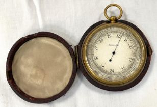 A 19th century brass cased pocket barometer in red leather case