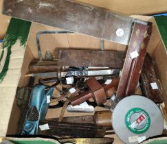 A selection of vintage tools; buckles; etc