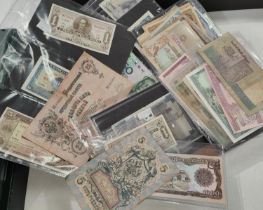 A collection of Chinese and other vintage banknotes