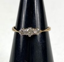 An 18 carat hallmarked gold ring set 3 diamonds, size L, 1.8g