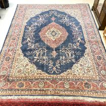 An old Turkey carpet, worn, 380 x 290cm