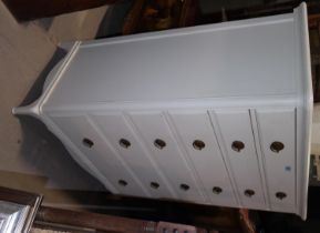 A modern period style chest of 6 long drawers with brass handles and shaped feet; width 100cm x