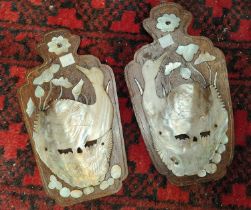 Two wood and mother of pearl wall hanging taper holders with birds and flowers decoration