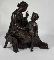 A French 19th century patinated group mother and child, mother seated in Greek/Roman clothing,
