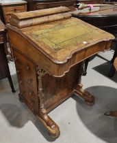 A Victorian inlaid walnut Davenport desk with slope front and 4 side drawers