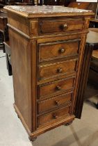 A walnut 6 height cabinet with marble top