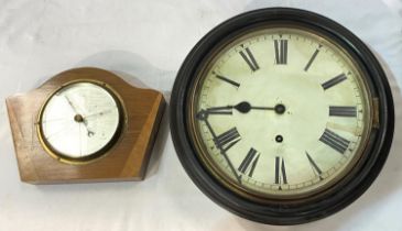 A late 19th/early 20th century wall clock with circular dial; a barometer