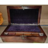 A 19th century mahogany brass bound lap desk
