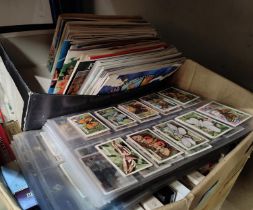 A large collection of pre and postwar cigarette and trade cards