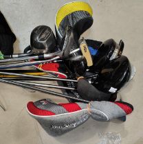 A selection of modern golf clubs.