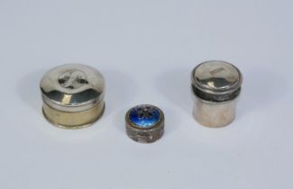 A miniature box in white metal and enamel;a cylindrical hallmarked silver pill box and a silver